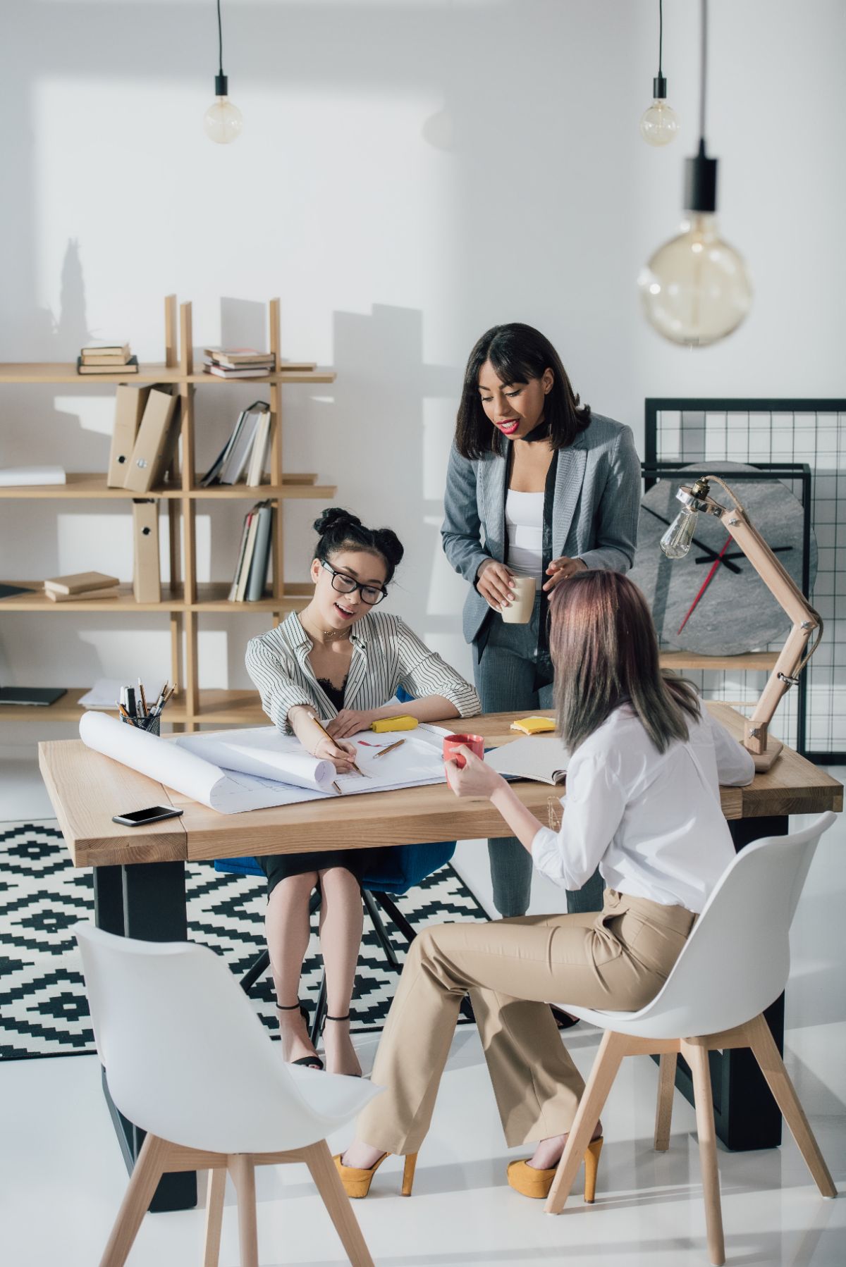 Three business owners working together at a table